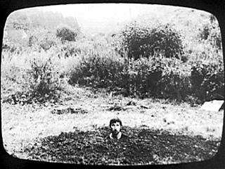 Keith Arnatt »Self Burial« | Self-Burial